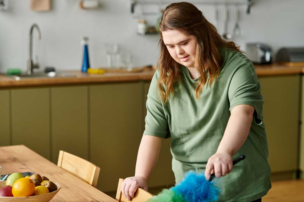Avican Support staff supporting an individual